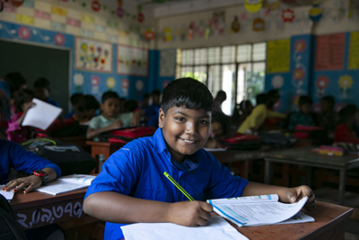 CH1651504_Sohan,_9,_smiles_during_a_lesson_at_school_in_Rajbari_District,_Bangladesh.JPG